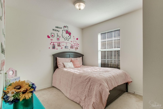 1408 Dunhurst Dr, Pensacola, FL 32534 - bedroom featuring light colored carpet and baseboards