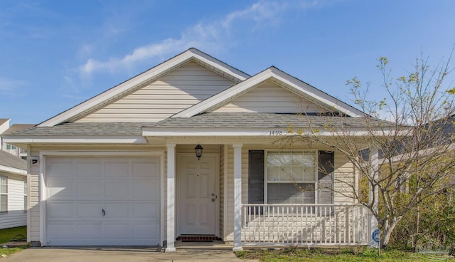 1408 Dunhurst Dr, Pensacola, FL 32534 - view of front of house featuring a porch, a garage, roof with shingles, and concrete driveway