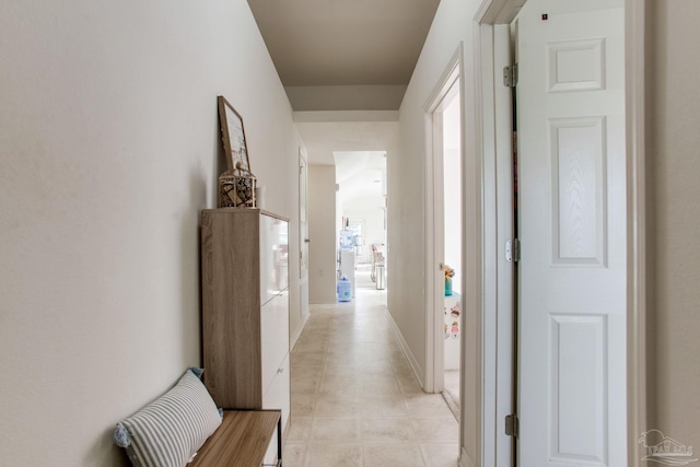 1408 Dunhurst Dr, Pensacola, FL 32534 - hallway with light tile patterned flooring and baseboards