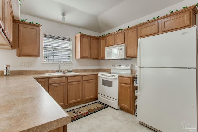 1408 Dunhurst Dr, Pensacola, FL 32534 - kitchen with a sink, light countertops, brown cabinetry, and white appliances