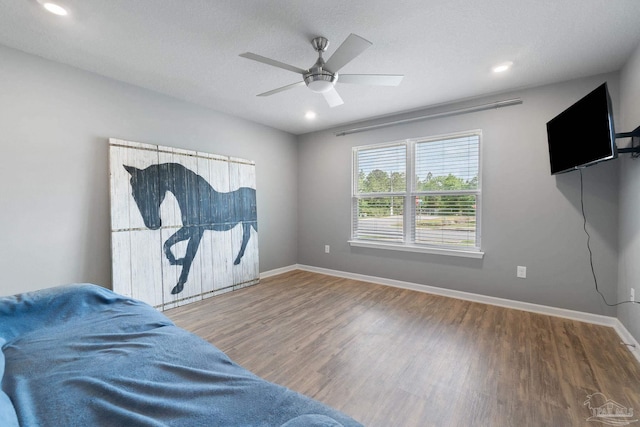 sitting room featuring recessed lighting, wood finished floors, a ceiling fan, and baseboards