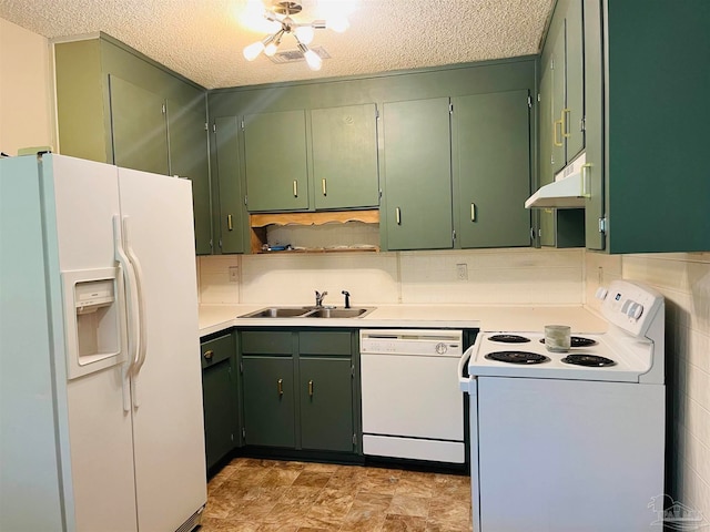 kitchen featuring sink, green cabinets, a textured ceiling, and white appliances