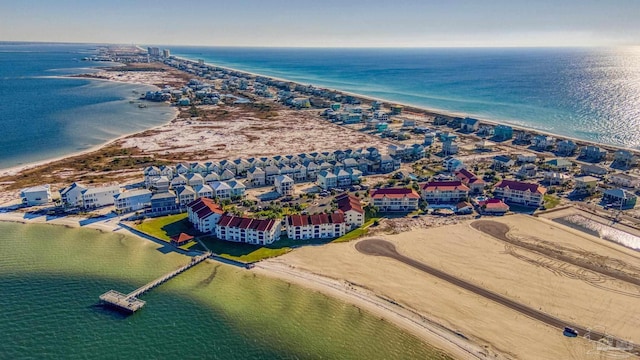 aerial view featuring a water view and a beach view