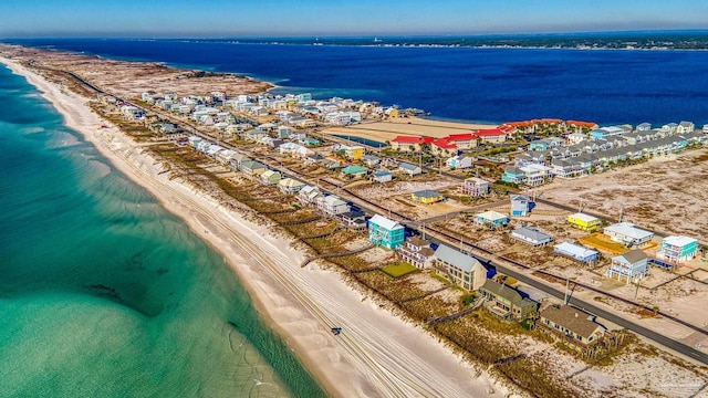 aerial view featuring a water view and a beach view