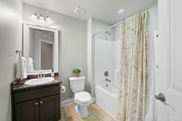 full bathroom with tile patterned floors, toilet, a textured ceiling, vanity, and shower / bath combination with curtain