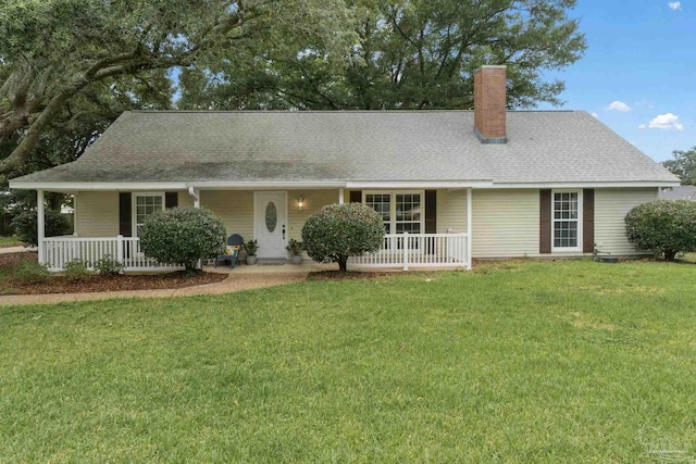 4507 Whisper Way, Pensacola, FL 32504 - view of front of home with a porch, a chimney, and a front yard