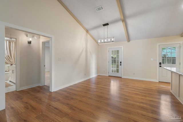 4507 Whisper Way, Pensacola, FL 32504 - unfurnished living room featuring high vaulted ceiling, healthy amount of natural light, wood finished floors, and beamed ceiling