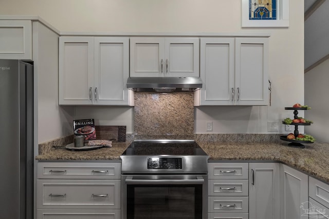 4507 Whisper Way, Pensacola, FL 32504 - kitchen featuring exhaust hood, appliances with stainless steel finishes, tasteful backsplash, and stone countertops