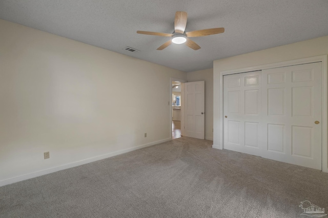 4507 Whisper Way, Pensacola, FL 32504 - unfurnished bedroom with carpet, a closet, a textured ceiling, and a ceiling fan