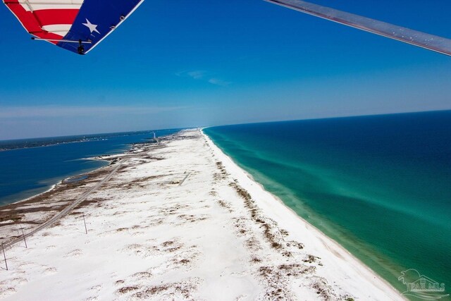 property view of water featuring a beach view