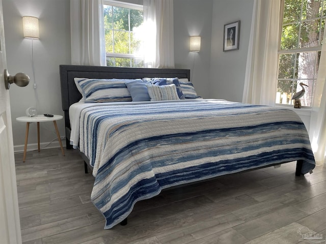 bedroom featuring wood-type flooring