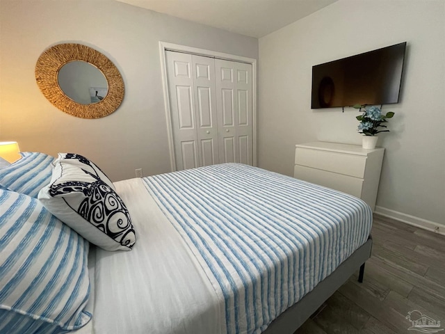 bedroom featuring a closet and hardwood / wood-style floors