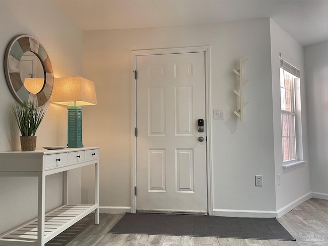 foyer with light wood-type flooring