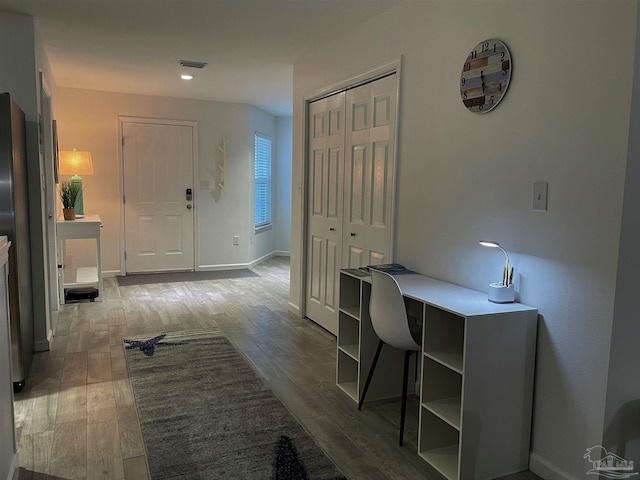 home office featuring dark hardwood / wood-style flooring