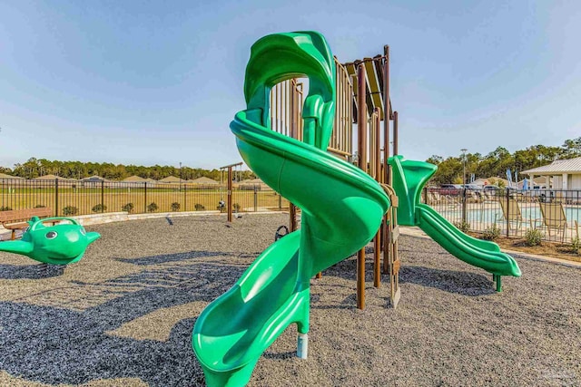 community jungle gym with fence