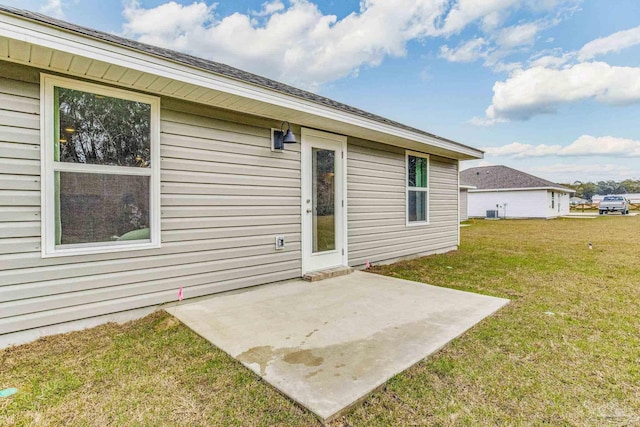 exterior space featuring a yard and a patio