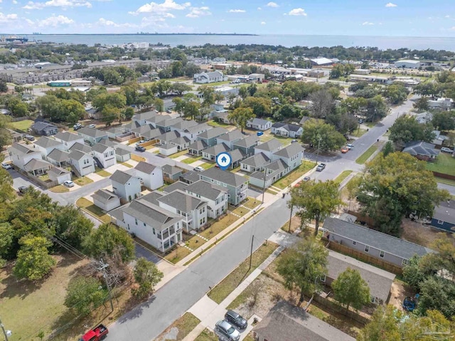 aerial view featuring a water view and a residential view