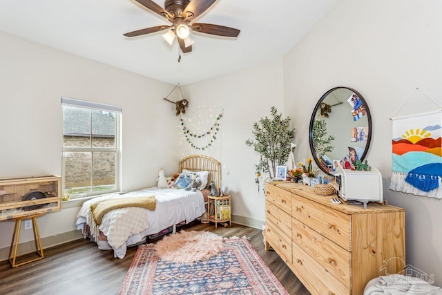 1058 Iron Forge Rd, Cantonment, FL 32533 - bedroom featuring wood finished floors, ceiling fan, and baseboards