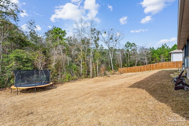 1058 Iron Forge Rd, Cantonment, FL 32533 - view of yard with a trampoline