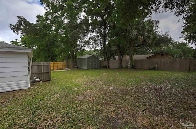 316 Dolphin St, Gulf Breeze, FL 32561 - view of yard featuring a shed and an outbuilding