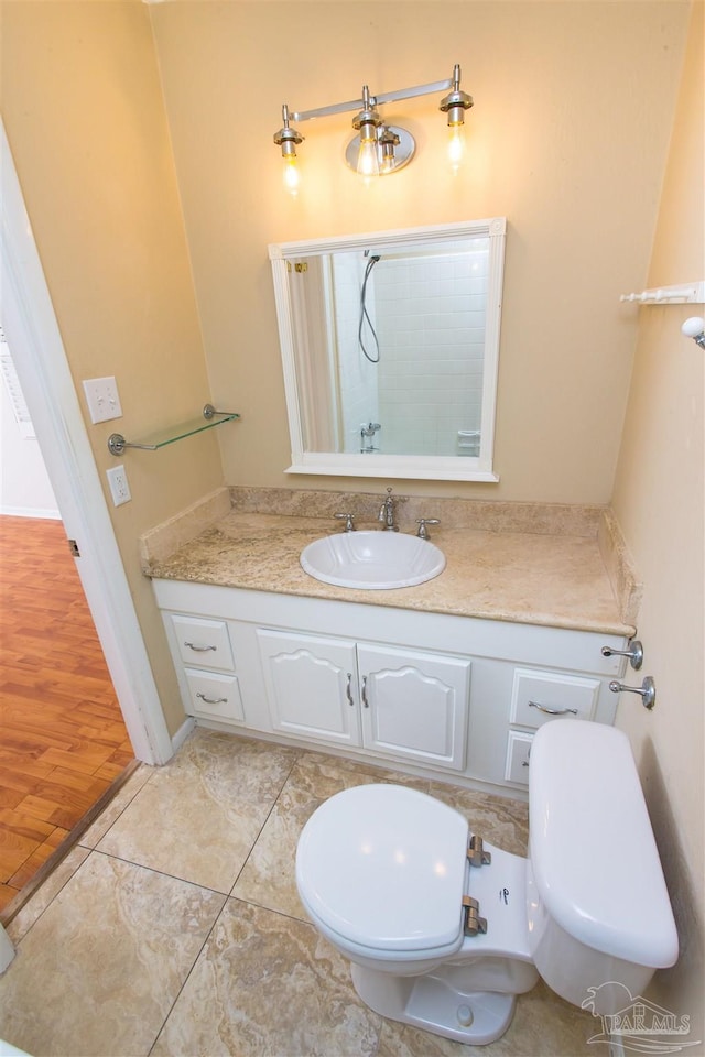 316 Dolphin St, Gulf Breeze, FL 32561 - bathroom featuring vanity, tile patterned flooring, a shower, and toilet