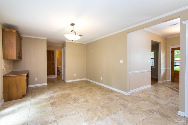 316 Dolphin St, Gulf Breeze, FL 32561 - empty room with crown molding and baseboards