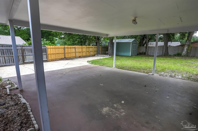 316 Dolphin St, Gulf Breeze, FL 32561 - view of patio / terrace featuring a storage unit and an outdoor structure