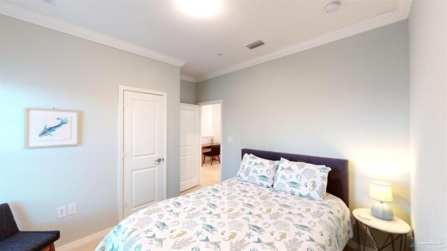 carpeted bedroom with crown molding