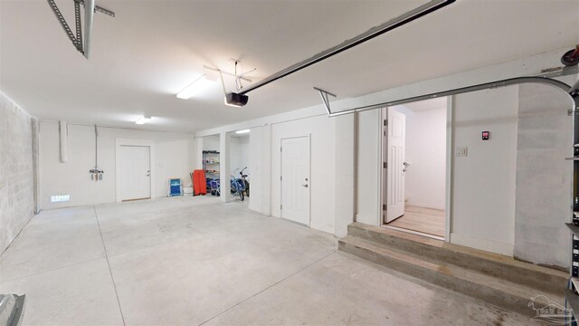 garage featuring a garage door opener