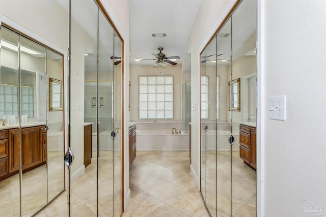 bathroom with vanity, ceiling fan, tile patterned floors, and separate shower and tub