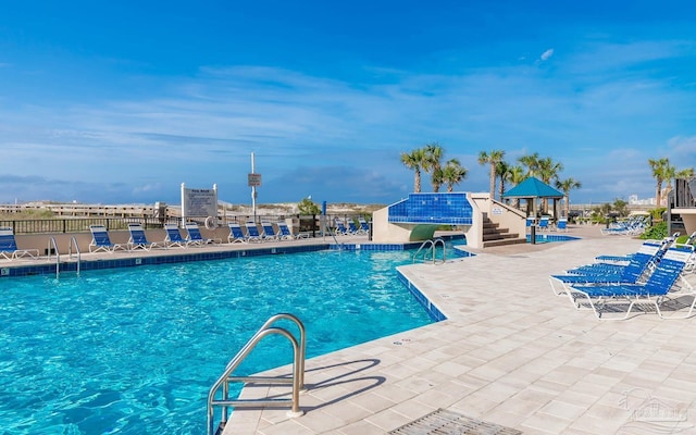 community pool with a patio