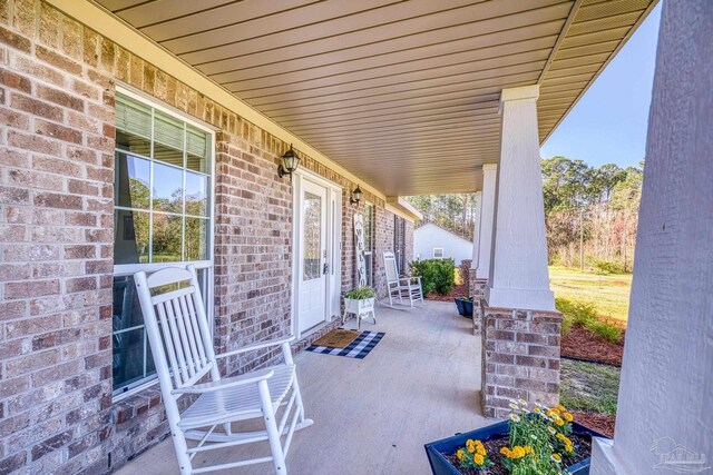 view of patio featuring covered porch