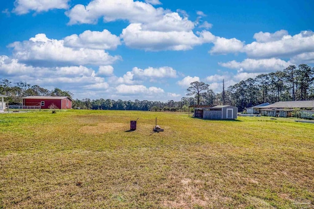 view of yard with an outbuilding and an outdoor structure