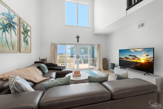 1299 Ft Pickens Rd Unit 6, Pensacola Beach, FL 32561 - living area featuring visible vents and a high ceiling