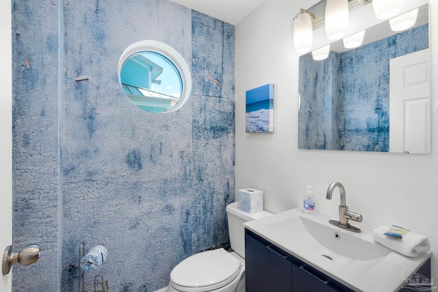 1299 Ft Pickens Rd Unit 6, Pensacola Beach, FL 32561 - bathroom featuring vanity and toilet