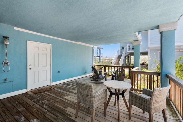 1299 Ft Pickens Rd Unit 6, Pensacola Beach, FL 32561 - deck featuring stairway