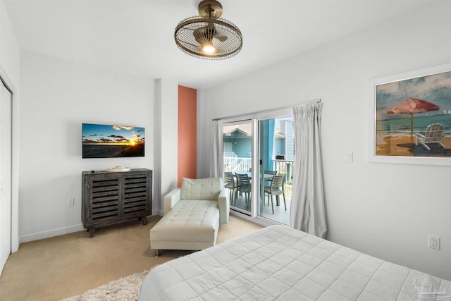 1299 Ft Pickens Rd Unit 6, Pensacola Beach, FL 32561 - bedroom with baseboards, carpet, and access to exterior
