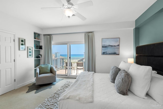 1299 Ft Pickens Rd Unit 6, Pensacola Beach, FL 32561 - carpeted bedroom featuring baseboards, a water view, access to exterior, and a ceiling fan