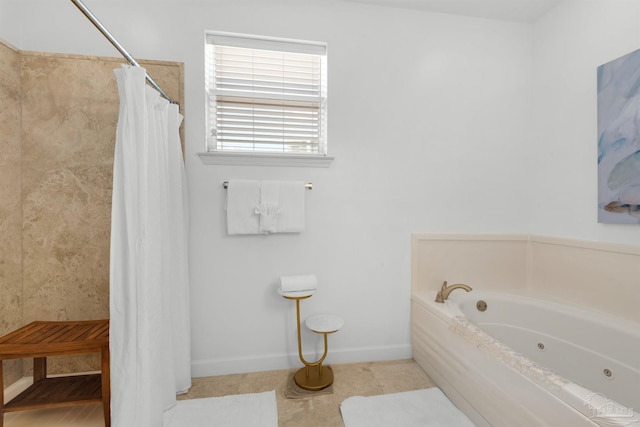 1299 Ft Pickens Rd Unit 6, Pensacola Beach, FL 32561 - full bath featuring baseboards, tiled shower, a tub with jets, and tile patterned flooring