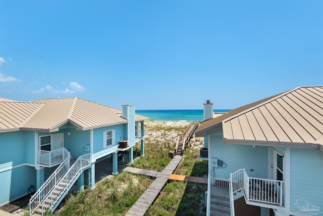 1299 Ft Pickens Rd Unit 6, Pensacola Beach, FL 32561 - water view with stairway and a beach view