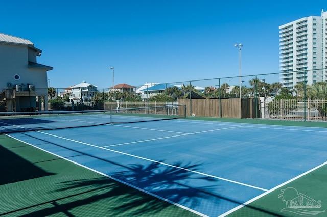 1299 Ft Pickens Rd Unit 6, Pensacola Beach, FL 32561 - view of sport court featuring community basketball court and fence