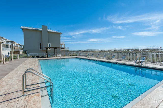 1299 Ft Pickens Rd Unit 6, Pensacola Beach, FL 32561 - community pool featuring a patio area and fence