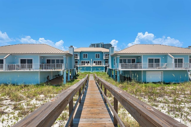 1299 Ft Pickens Rd Unit 6, Pensacola Beach, FL 32561 - back of property featuring metal roof and a standing seam roof
