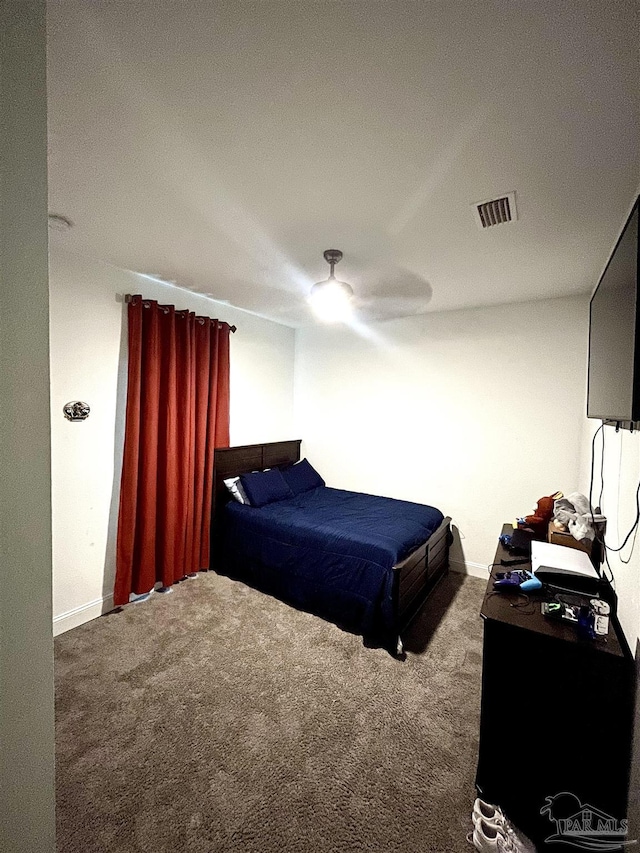 1315 W Scott St, Pensacola, FL 32501 - bedroom featuring visible vents, ceiling fan, carpet floors, and baseboards