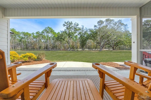 exterior space featuring a yard and a patio area