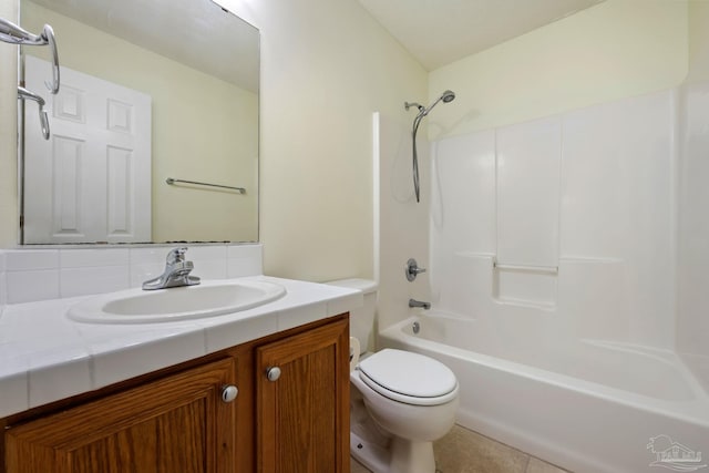 full bathroom featuring tasteful backsplash, vanity, shower / washtub combination, tile patterned flooring, and toilet