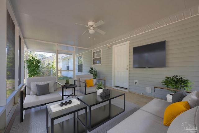 sunroom with ceiling fan