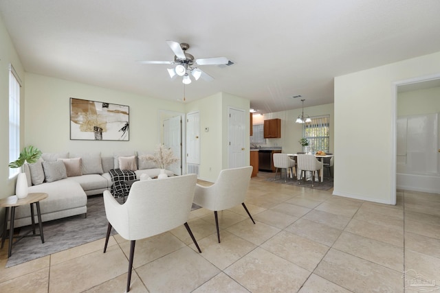 tiled living room featuring ceiling fan