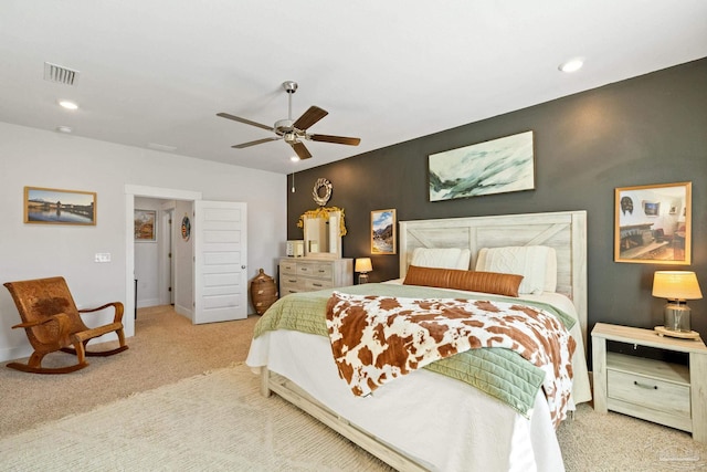 carpeted bedroom featuring ceiling fan