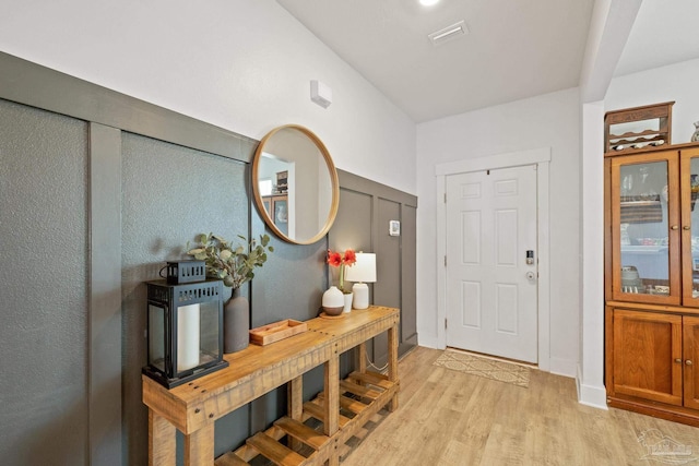 entrance foyer with light wood-type flooring